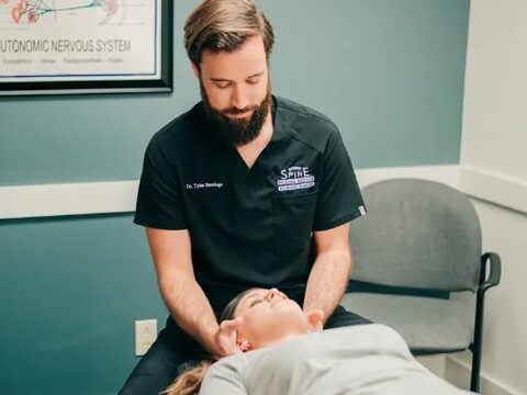 Dr. Jennings giving a gentle upper neck adjustment