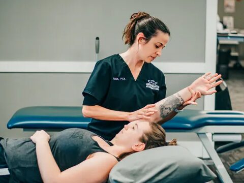 Riverside provider assessing a patient's shoulder