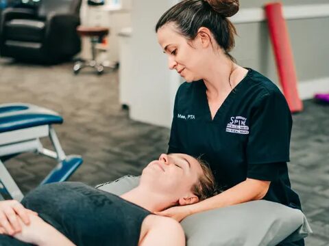 Riverside provider treating a patient's neck and shoulders